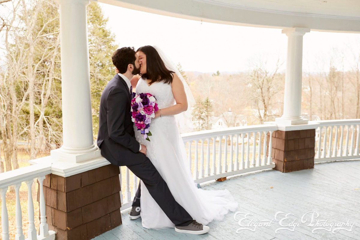 November Wedding november-wedding-couple-embracing-on-veranda