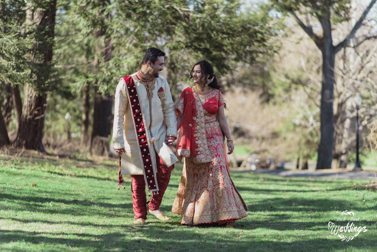 A Beautiful Moment bride-groom-walking-dressed-in-traditional-indian-wedding-clothing