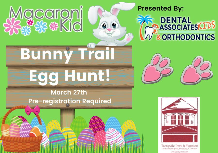 Bunny Trail Egg Hunt easter bunny waving over egg hunt sign